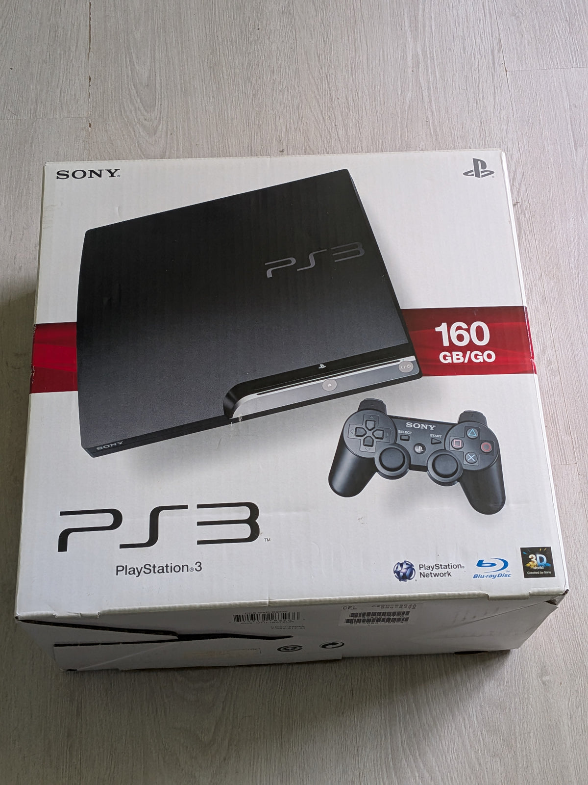 Ps3 slim en boîte