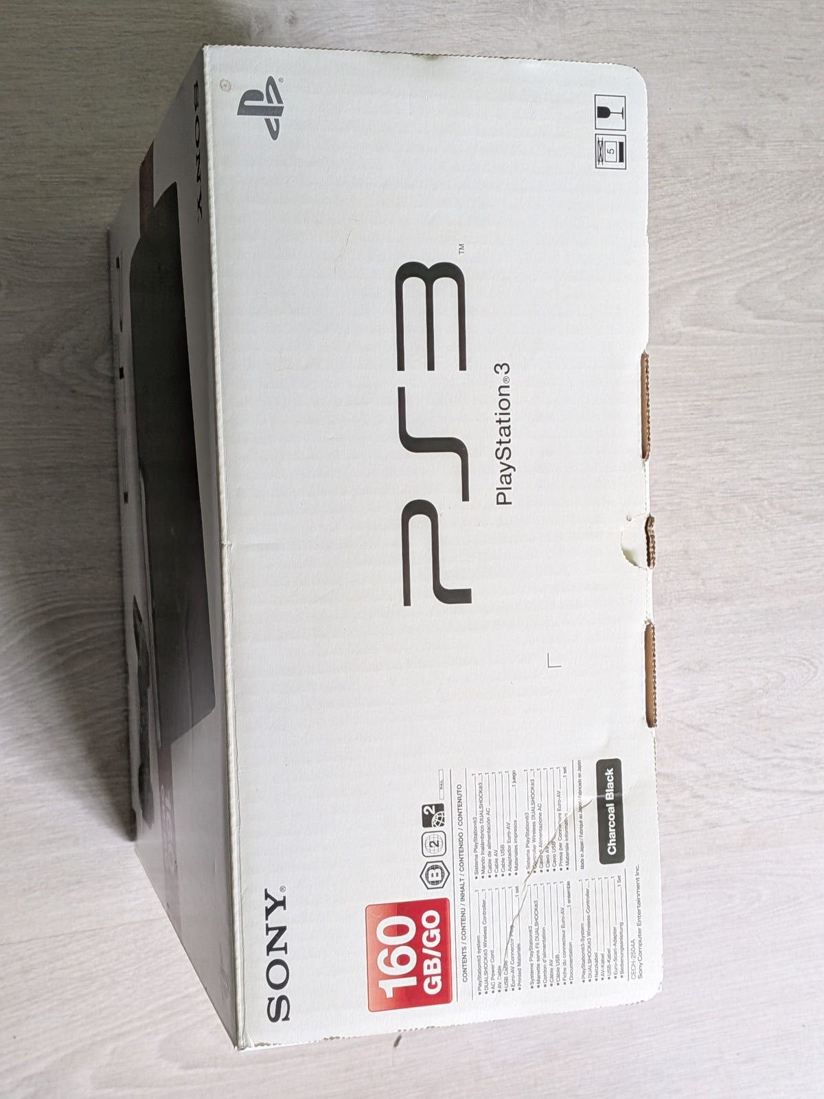 Ps3 slim en boîte